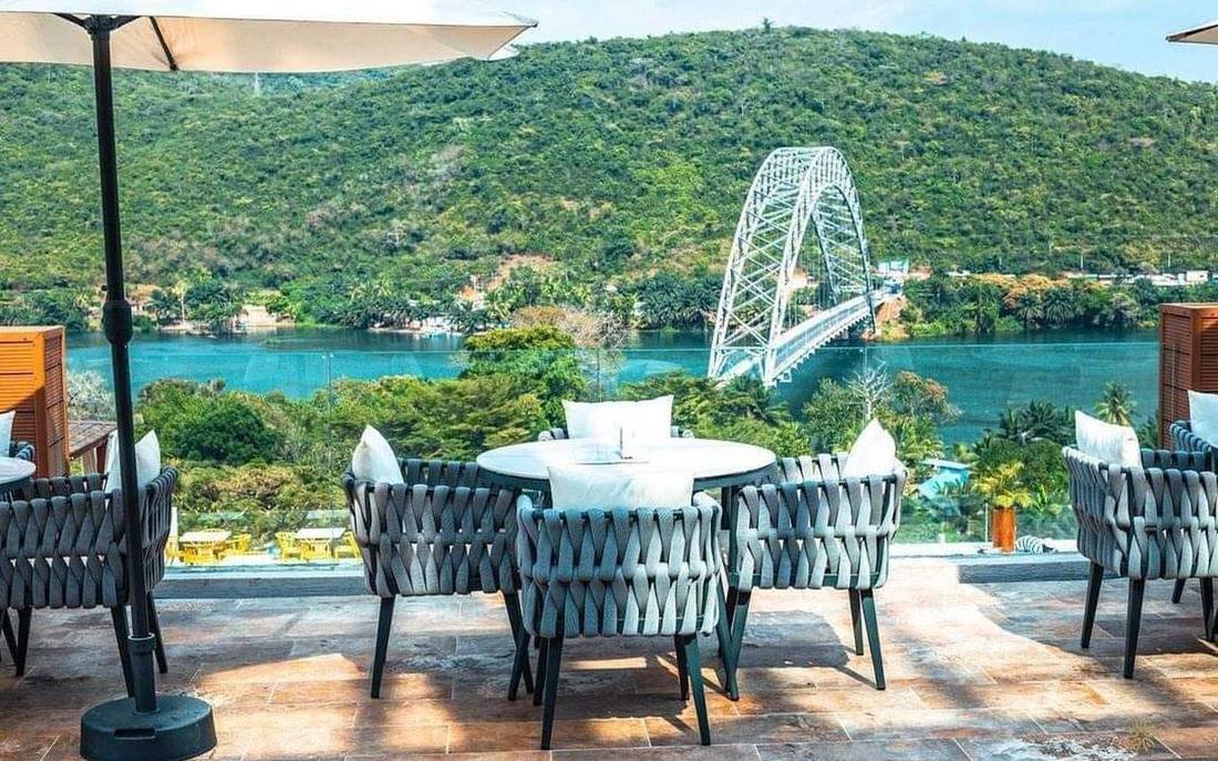 A terrace looking out over the Volta River and the Adomi Bridge
